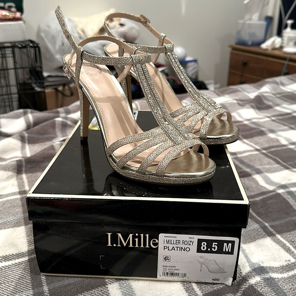 Brand new still in box gold heels 8.5